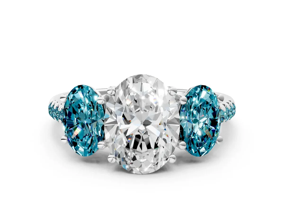 Three-Stone Oval Cut Diamond Ring with Round Blue Topaz Pavé Band and Prong Setting Silver