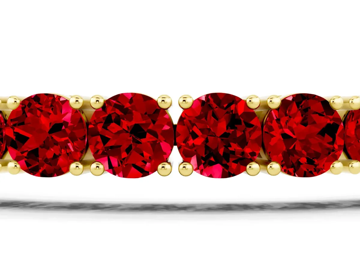 Round Brilliant Ruby Tennis Bracelet with Prong Setting Yellow gold