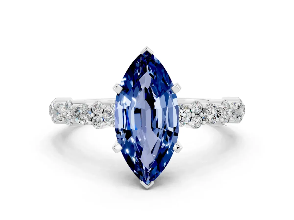 Marquise Cut Blue Sapphire Side Stone Solitaire Ring with Round and Four-Prong Setting Silver