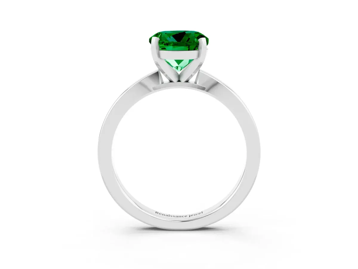 Round Cut Emerald Solitaire Engagement Ring with Classic Band and Four-Prong Setting Silver