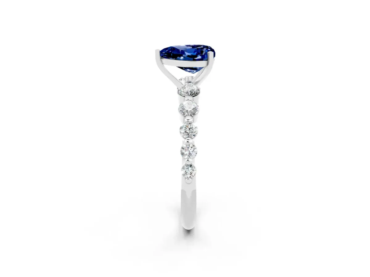 Heart Cut Solitaire Blue Sapphire Ring with Pave Band and Four-Prong Setting Silver