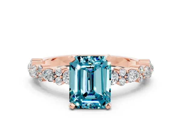 Emerald Cut Blue Topaz Side Stone Solitaire Ring with Round and Four-Prong Setting Rose gold