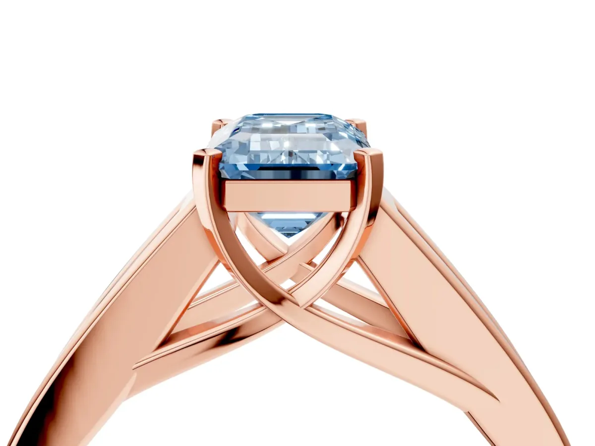 Fancy Blue Emerald Cut Cut Channel Set Solitaire Ring with Four-Prong Setting Rose gold