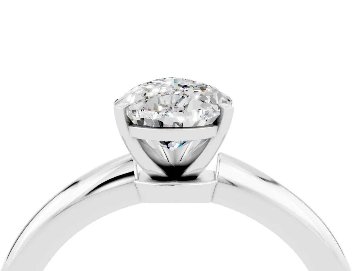 Pear Cut Moissanite Solitaire Ring with Six-Prong Setting and Classic Band Silver