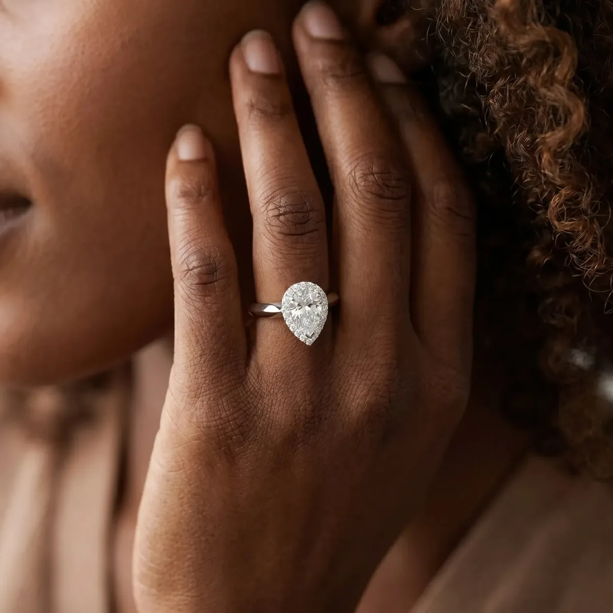 Halo Pear Cut Cut Solitaire Diamond Ring with Prong Setting Platinum
