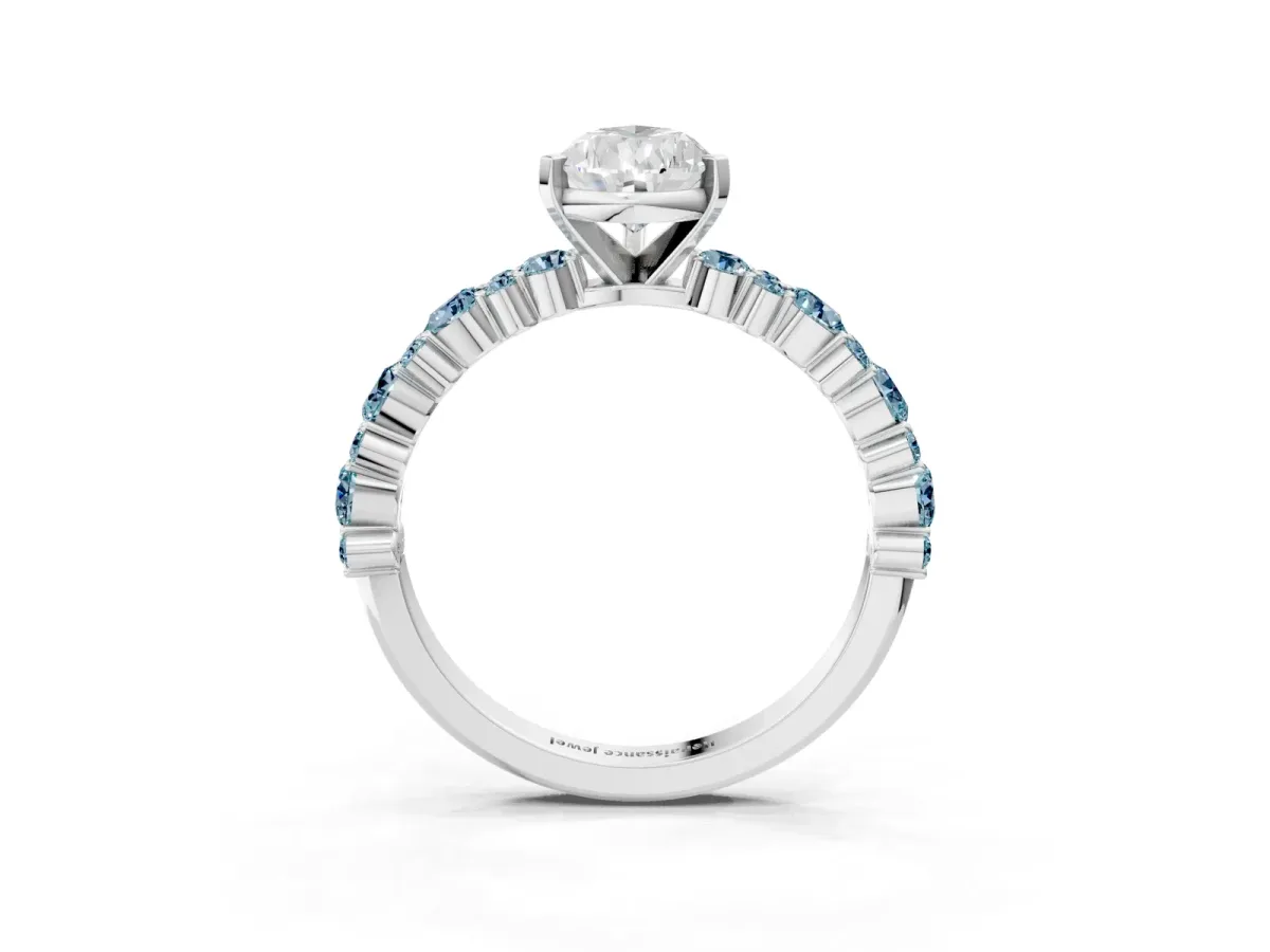 Pear Cut Diamond Side Stone Solitaire Ring with Round Aquamarine and Four-Prong Setting Silver