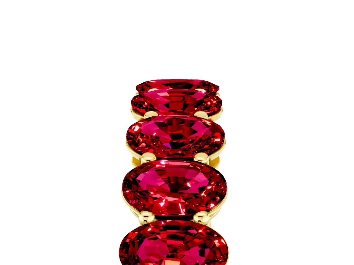 Oval Cut Ruby Eternity Band with Shared Prong Setting Yellow gold