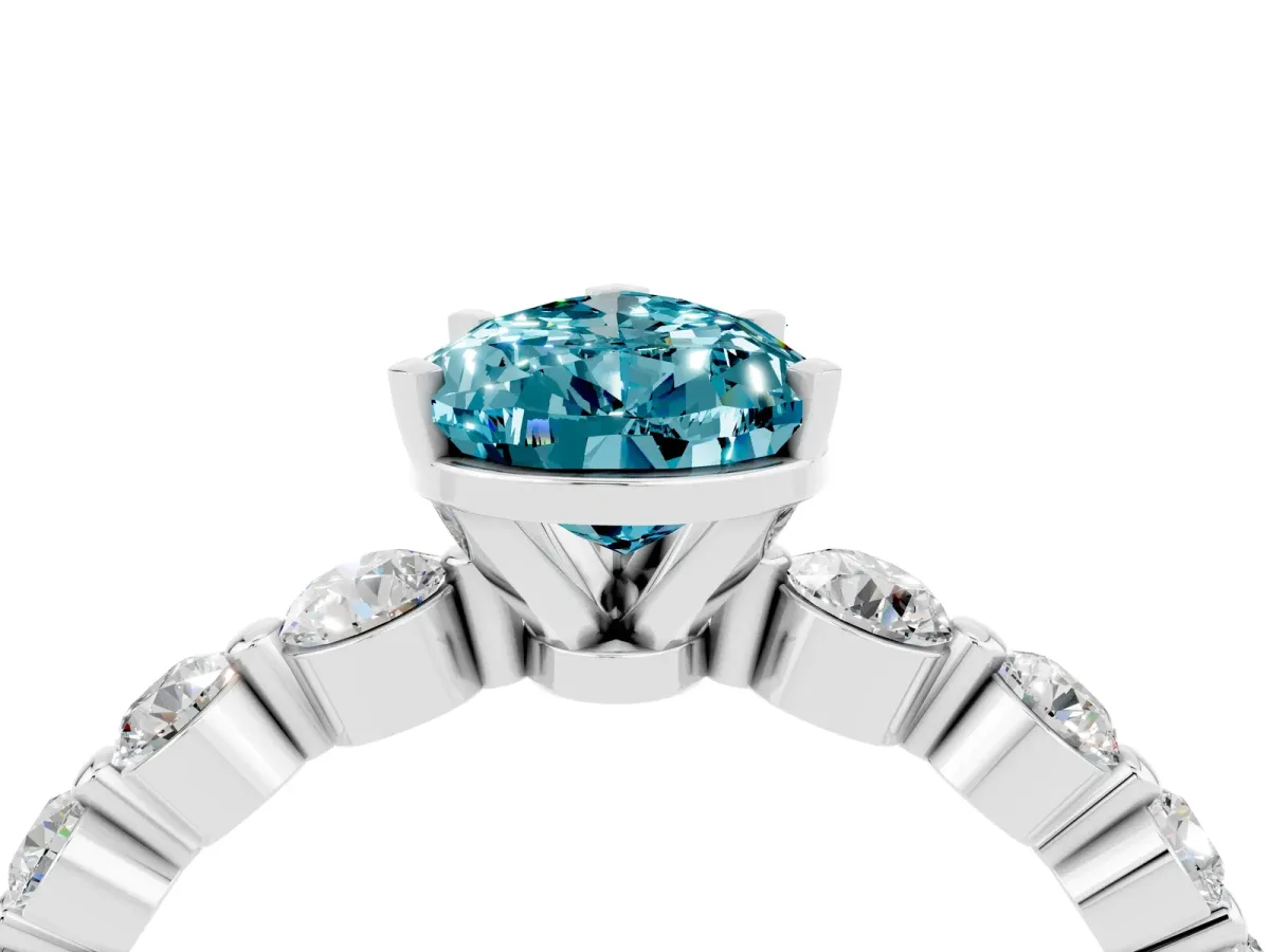 Pear Cut Solitaire Blue Topaz Ring with Pave Band and Four-Prong Setting Silver