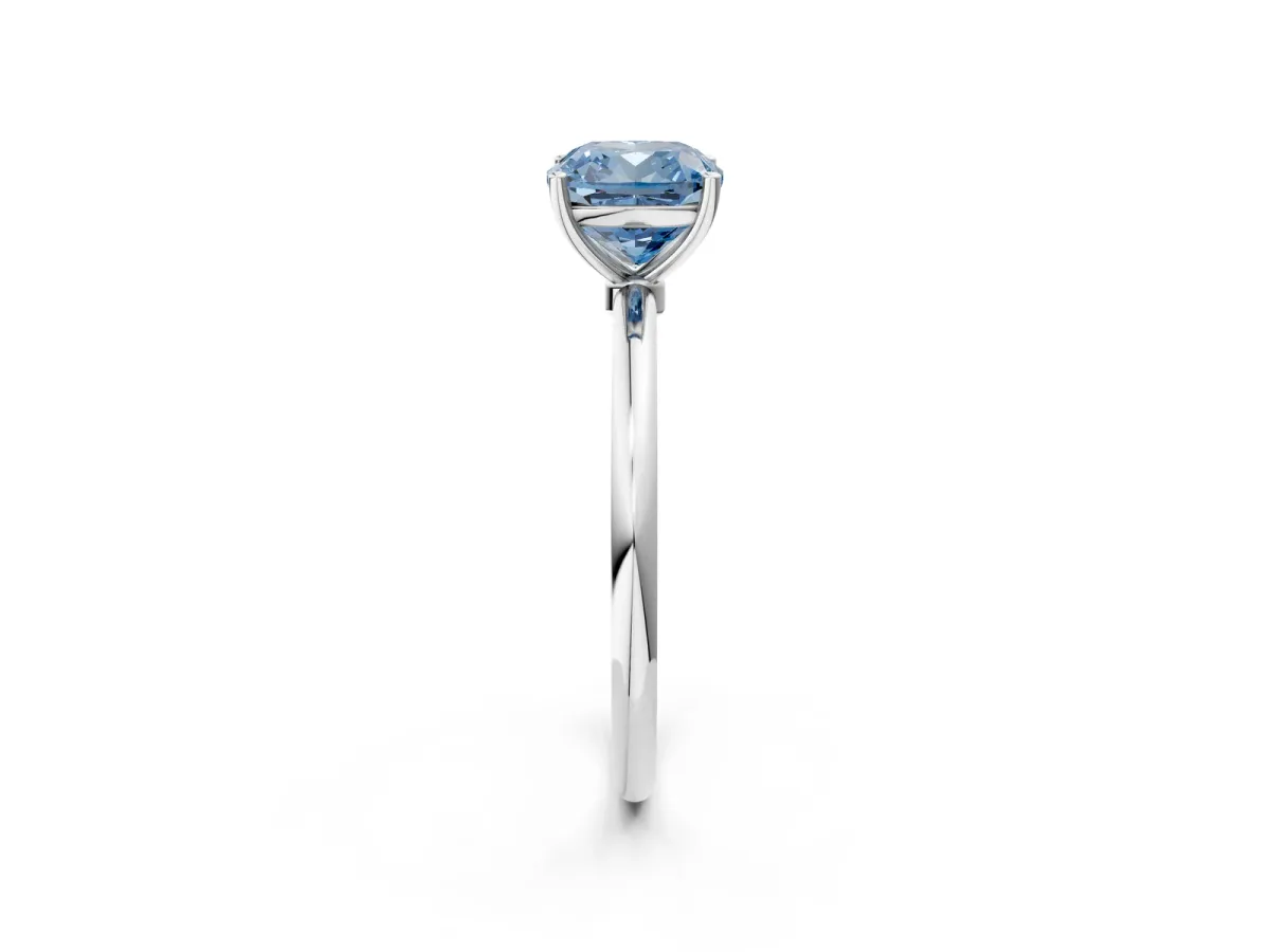 Fancy Blue Cushion Cut Cut Solitaire Engagement Ring with Thin Band and Four-Prong Setting Silver