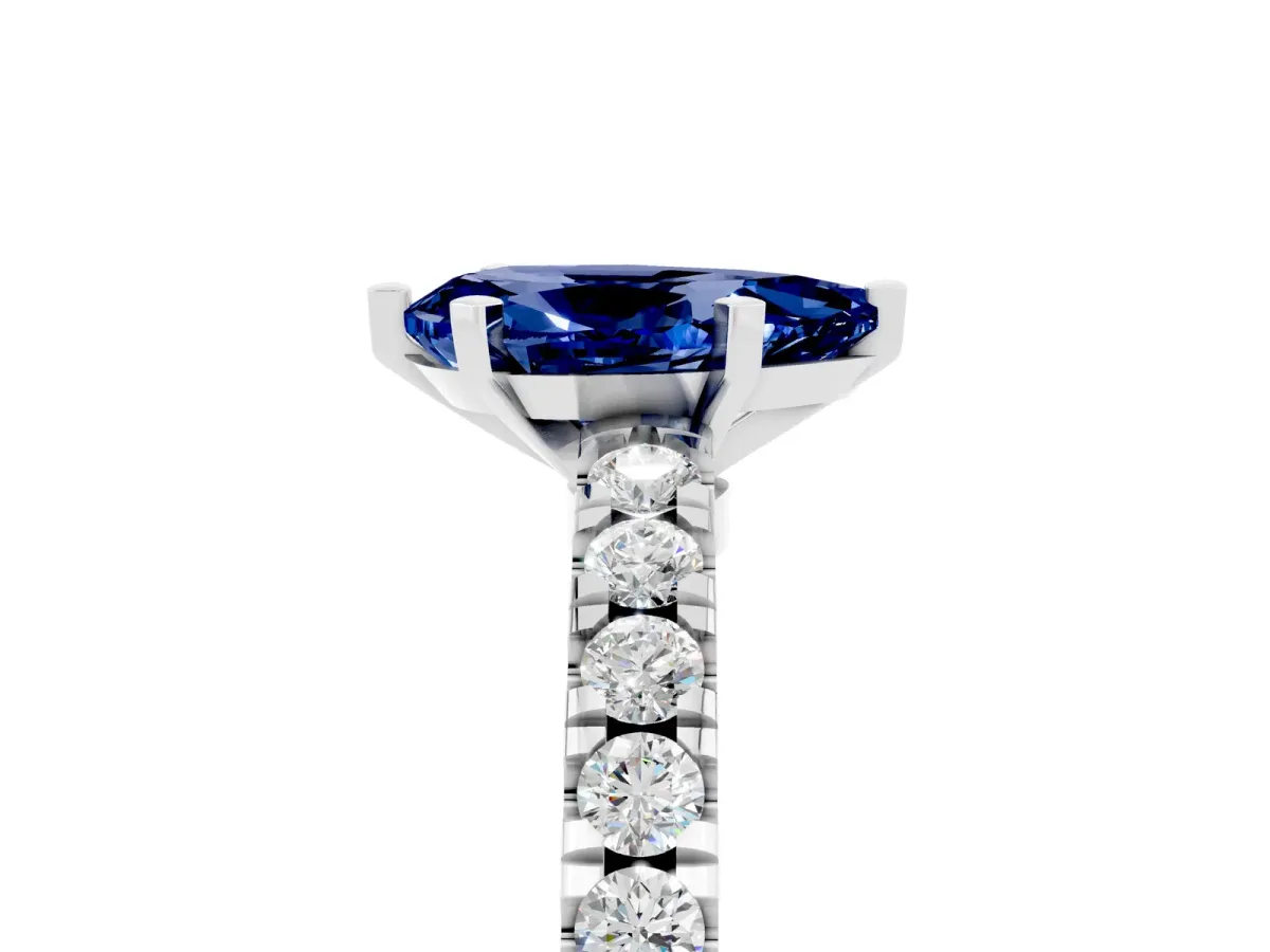 Pear Cut Solitaire Blue Sapphire with Pavé Band and Four-Prong Setting Silver