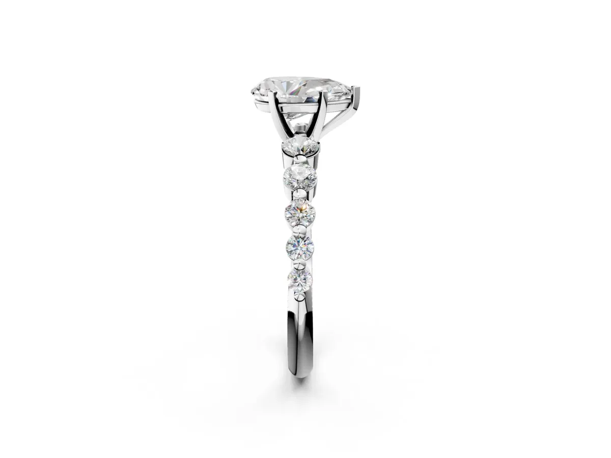 Pear Cut Solitaire Diamond Ring with Pave Band and Four-Prong Setting Silver