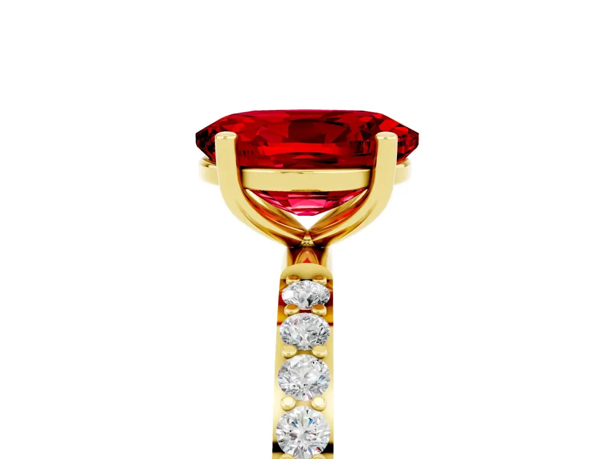 Oval Cut Ruby Solitaire Ring with Round Pavé Band and Prong Setting Yellow gold