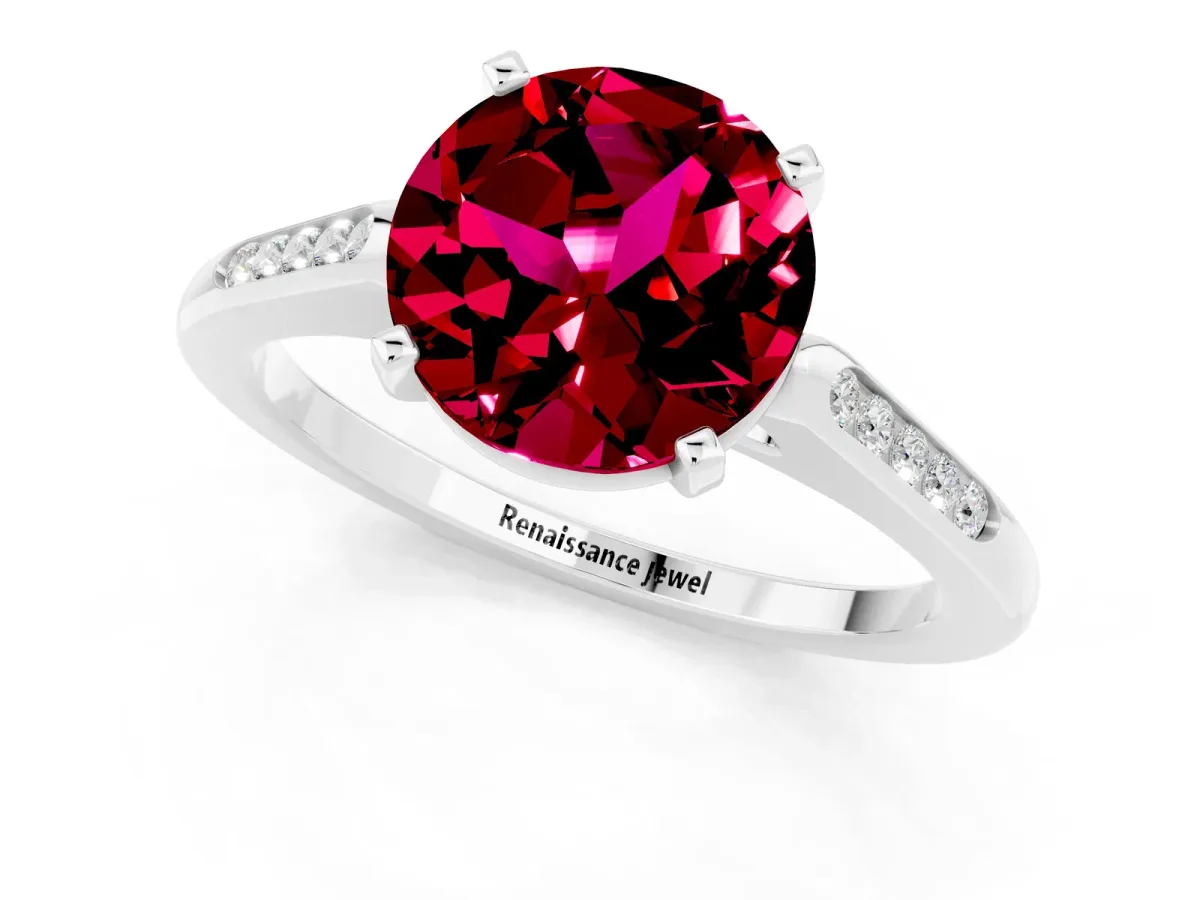 Round Cut Garnet Solitaire Ring with Channel Set Round Band and Prong Setting Platinum