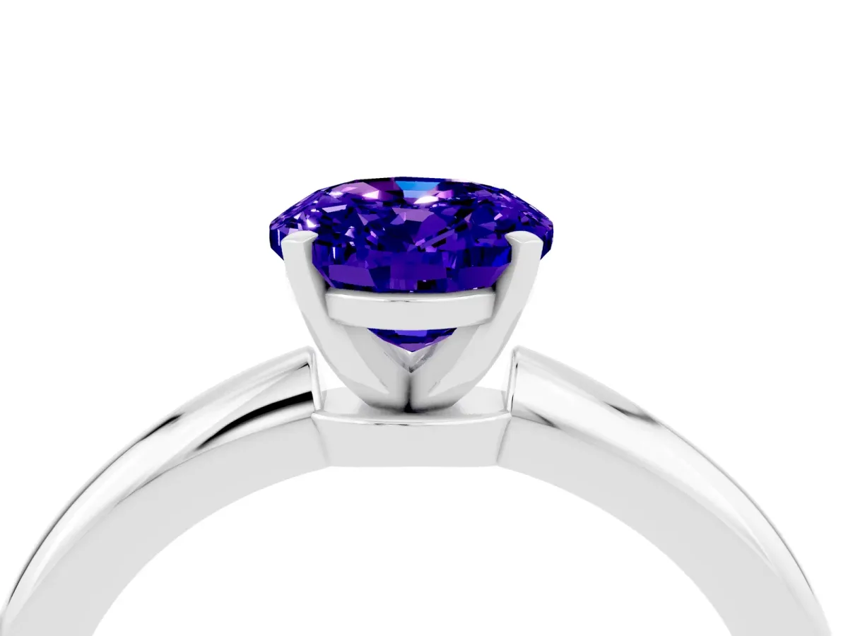 Oval Cut Tanzanite Solitaire Ring with Six-Prong Setting and Classic Band Silver