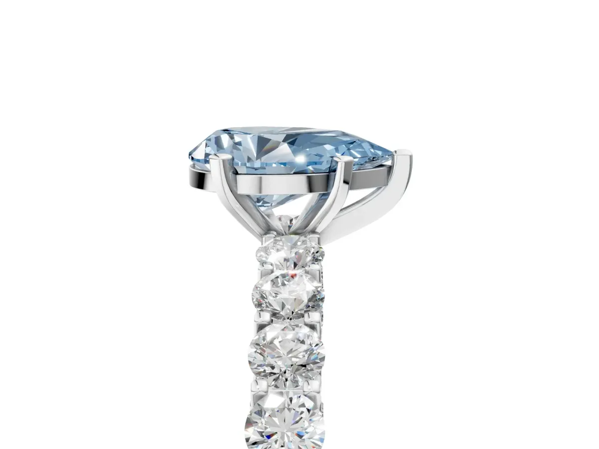 Fancy Blue Pear Cut Diamond Solitaire Ring with Shared Prong Pavé Band and Four-Prong Setting Silver