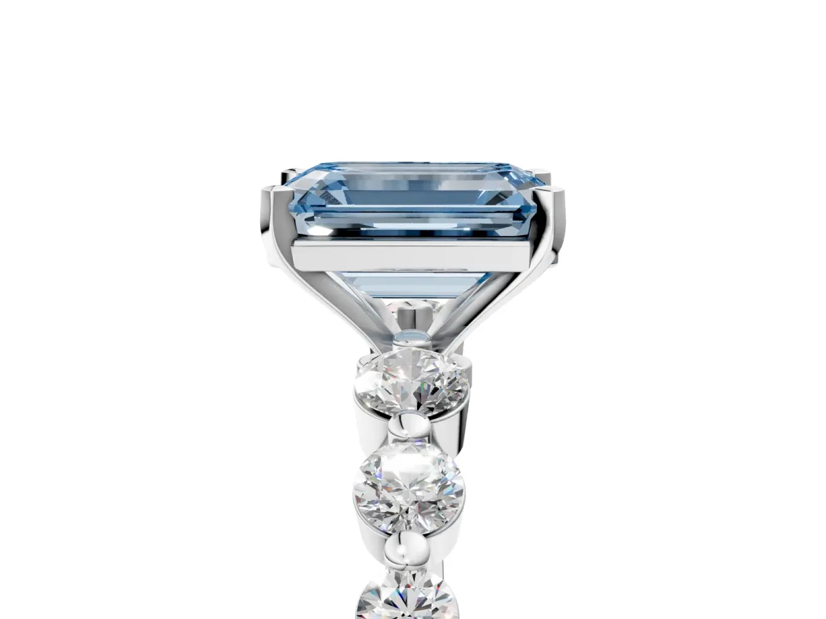 Fancy Blue Emerald Cut Solitaire Diamond Ring with Pave Band and Four-Prong Setting Silver
