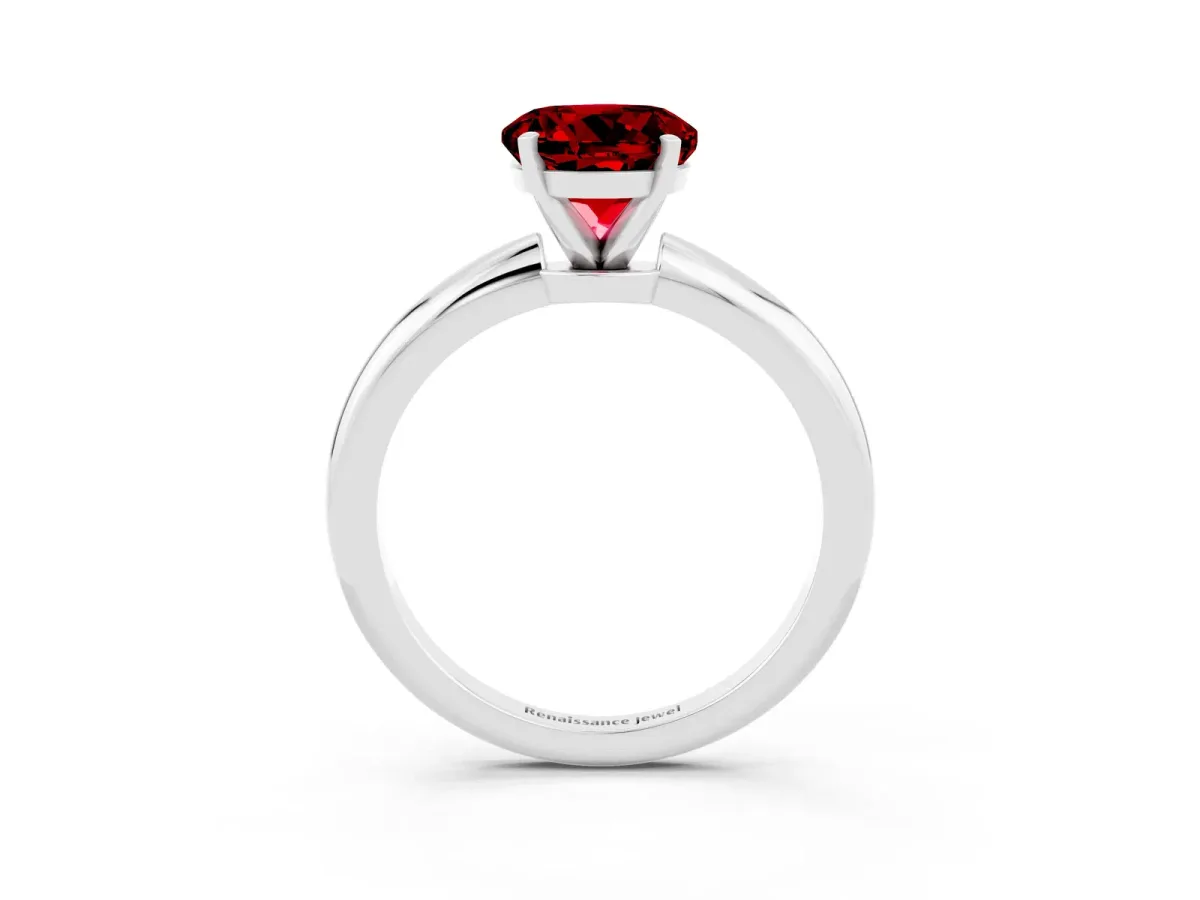 Round Cut Ruby Solitaire Ring with Six-Prong Setting and Classic Band Platinum