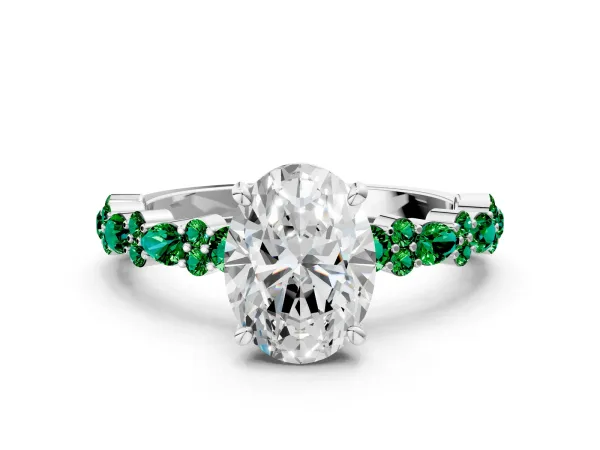 Oval Cut Diamond Side Stone Solitaire Ring with Round Emerald and Four-Prong Setting White gold
