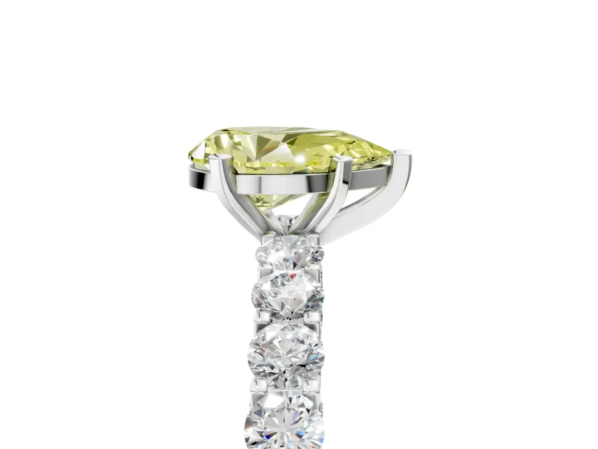 Fancy Yellow Pear Cut Diamond Solitaire Ring with Shared Prong Pavé Band and Four-Prong Setting Silver