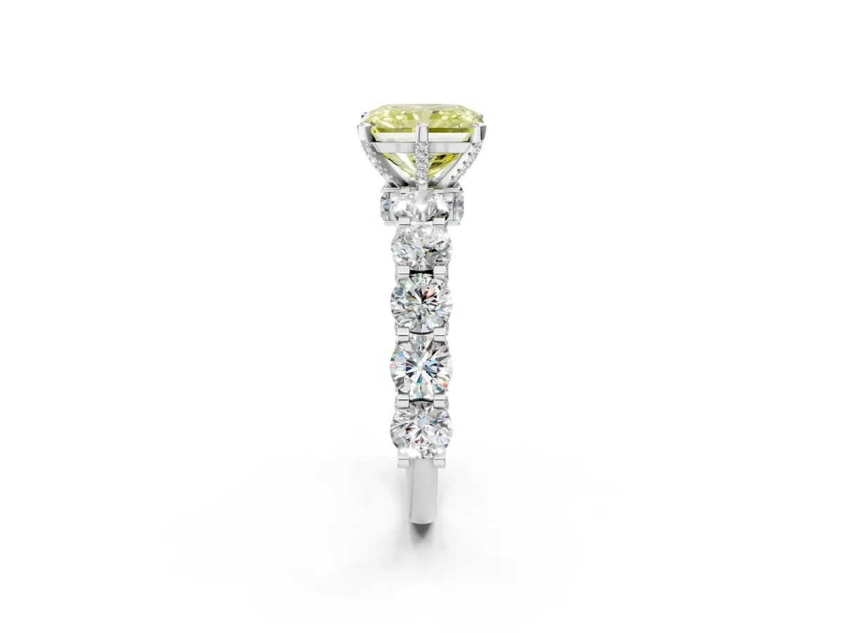 Fancy Yellow Radiant Cut Diamond Side Stone Engagement Ring with Four-Prong Setting Platinum