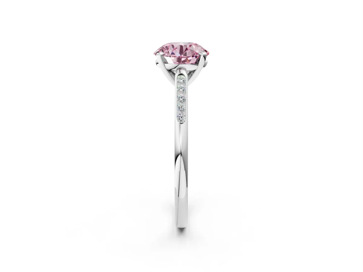 Fancy Pink Round Cut Diamond Solitaire Ring with Channel Set Round Band and Prong Setting Silver