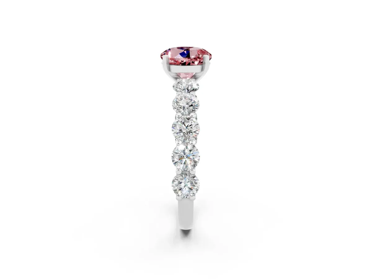 Round Cut Morganite Prong Setting with Side Stones on a Pave Band Silver