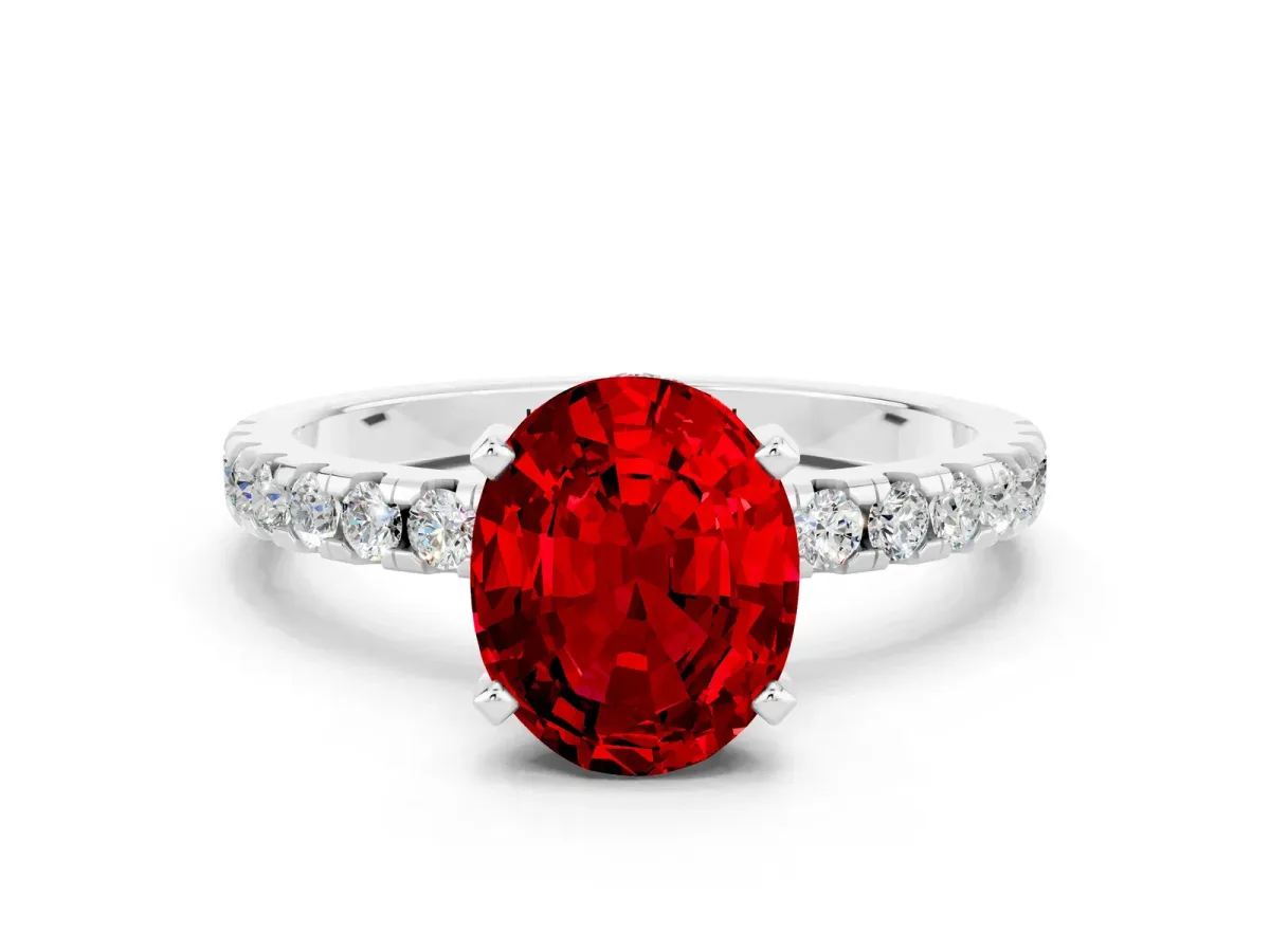 Oval Cut Ruby Solitaire Ring with Round Pavé Band and Four-Prong Setting Silver