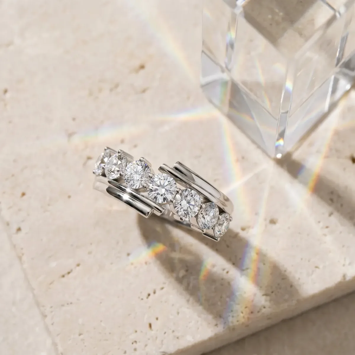 Round Diamond Wave Band with Channel and Shared Prong Setting Platinum
