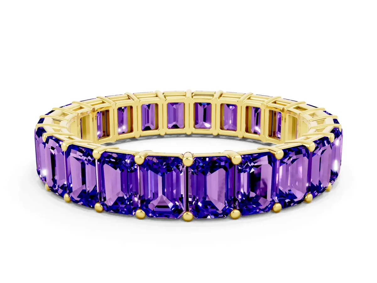 Emerald Cut Tanzanite Eternity Band with Shared Prong Setting Yellow gold