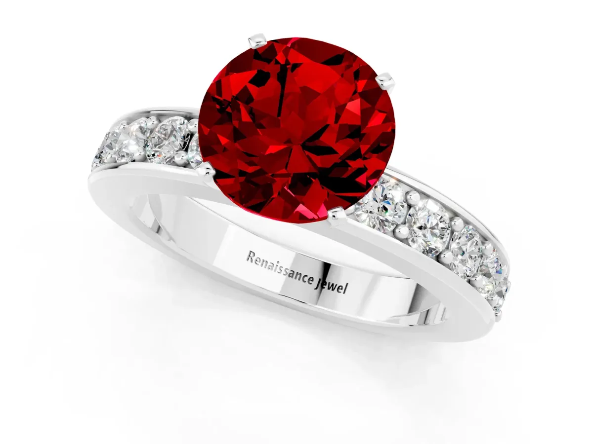 Round Cut Ruby Engagement Ring with Channel Set Round Band and Prong Setting White gold