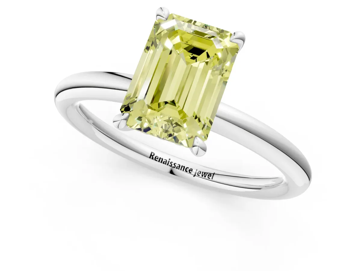 Fancy Yellow Emerald Cut Diamond Solitaire Ring with Thin Band and Four-Prong Setting Platinum