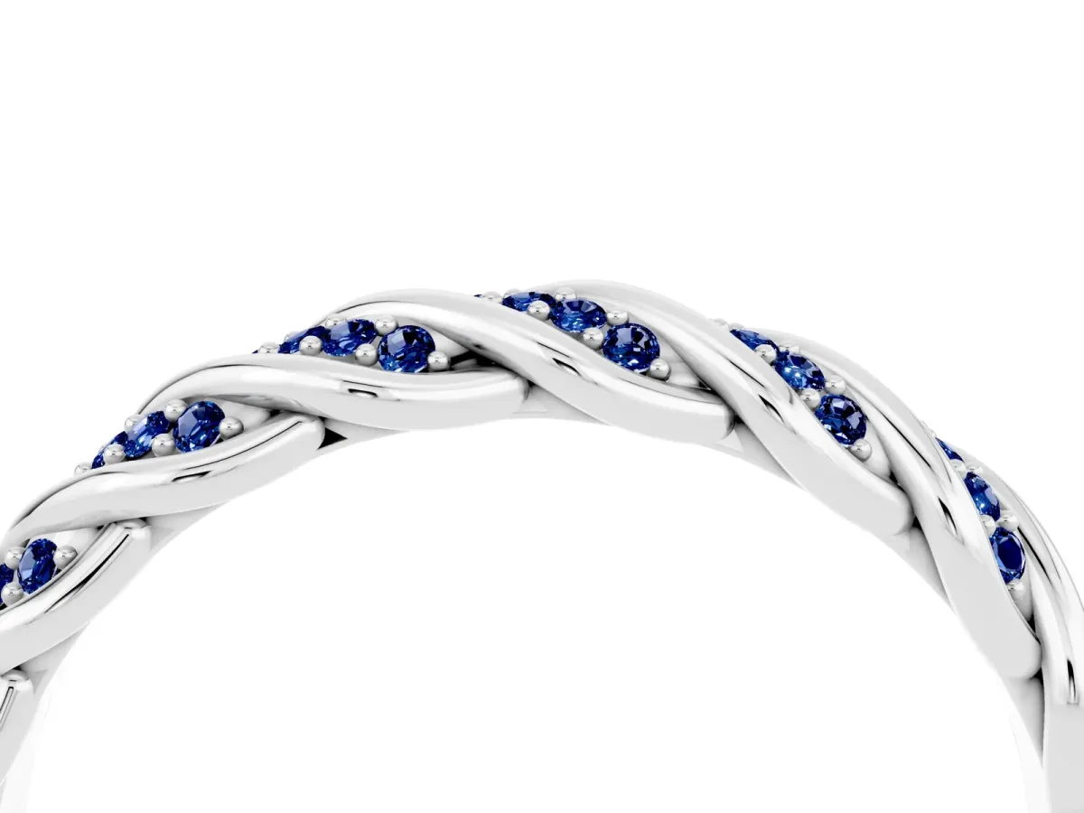 Twisted Pavé Round Blue Sapphire Eternity Band with Shared Prong Setting Platinum