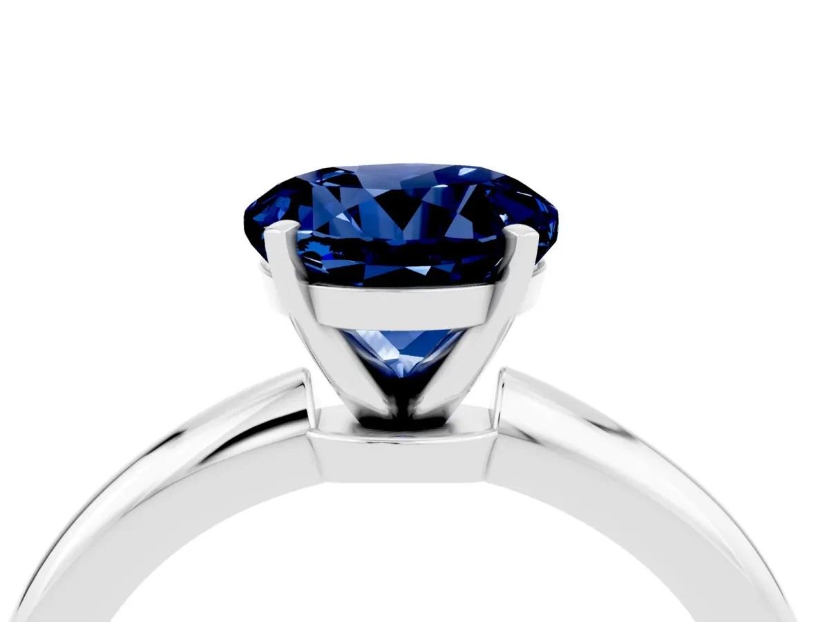 Round Cut Blue Sapphire Solitaire Ring with Six-Prong Setting and Classic Band Silver