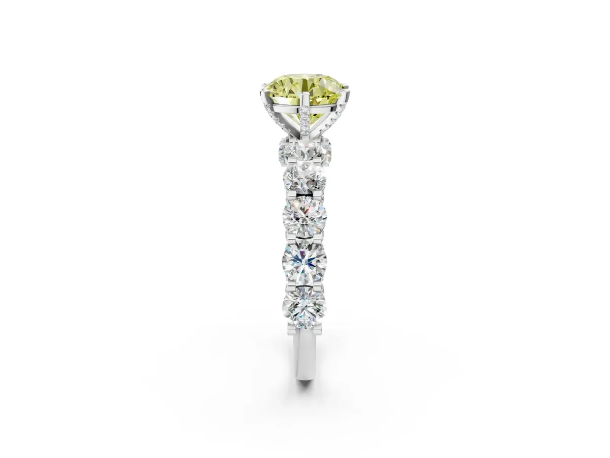 Fancy Yellow Round Cut Diamond Side Stone Engagement Ring with Four-Prong Setting White gold