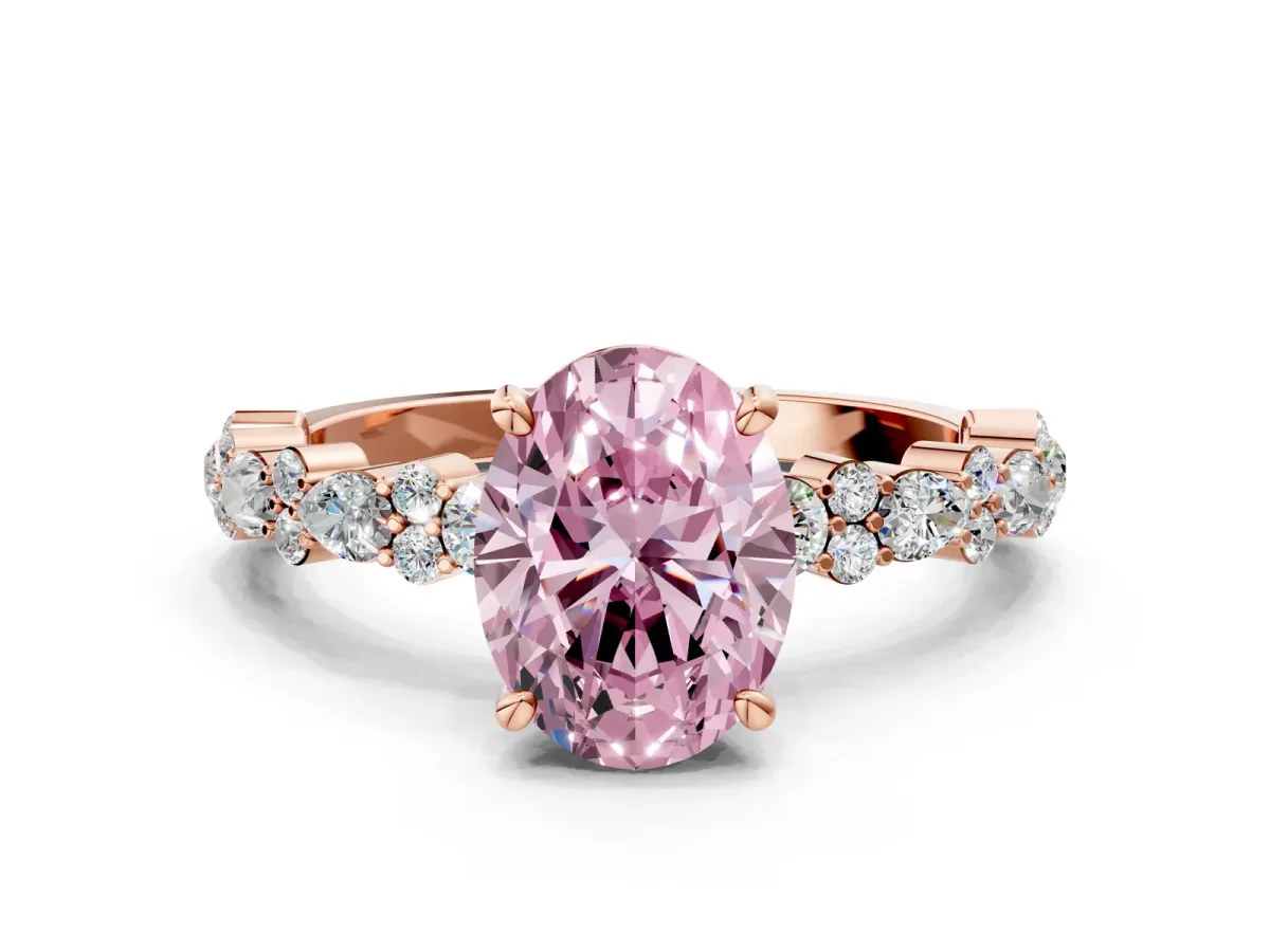 Fancy Pink Oval Cut Diamond Side Stone Solitaire Ring with Round and Four-Prong Setting Rose gold