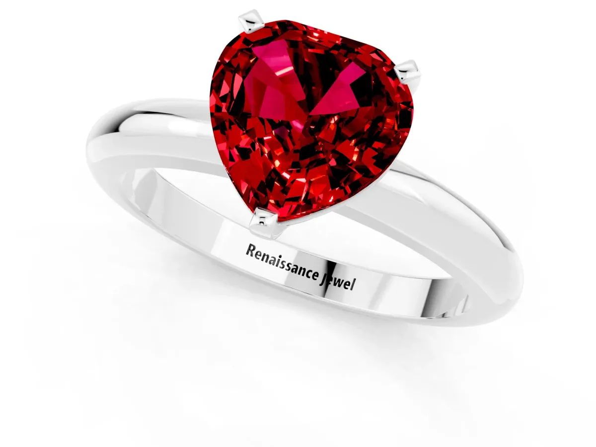 Heart Cut Ruby Solitaire Engagement Ring with Round Band and Four-Prong Setting Silver