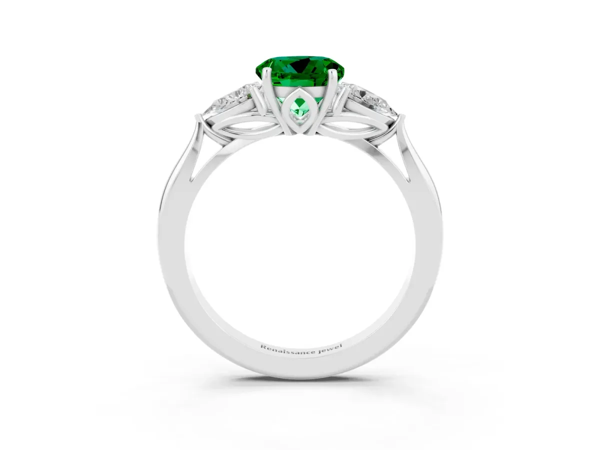 Three-Stone Round Cut Emerald Ring with Pear Side Stones in Four-Prong Setting Platinum