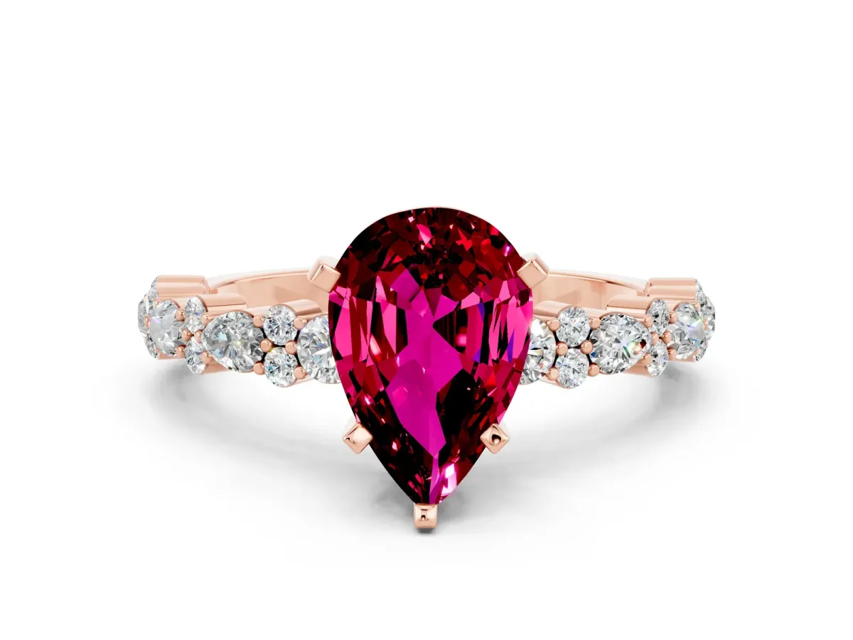 Pear Cut Garnet Side Stone Solitaire Ring with Round and Four-Prong Setting Rose gold