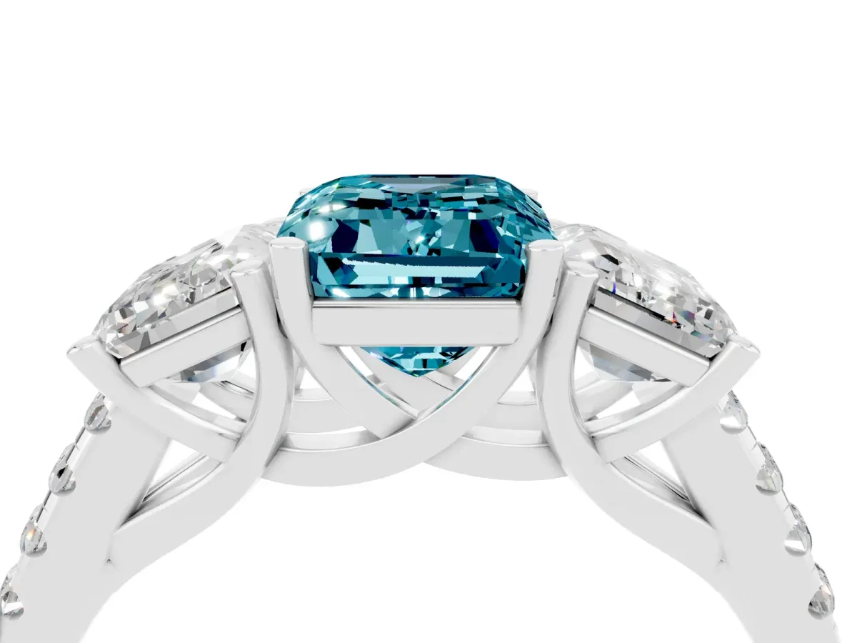 Three-Stone Emerald Cut Blue Topaz Ring with Round Pavé Band and Prong Setting Platinum