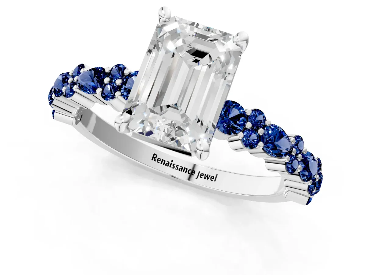 Emerald Cut Diamond Side Stone Solitaire Ring with Round Blue Sapphire and Four-Prong Setting Platinum