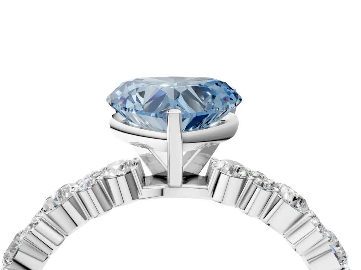 Fancy Blue Heart Cut Diamond Side Stone Solitaire Ring with Round and Four-Prong Setting Silver