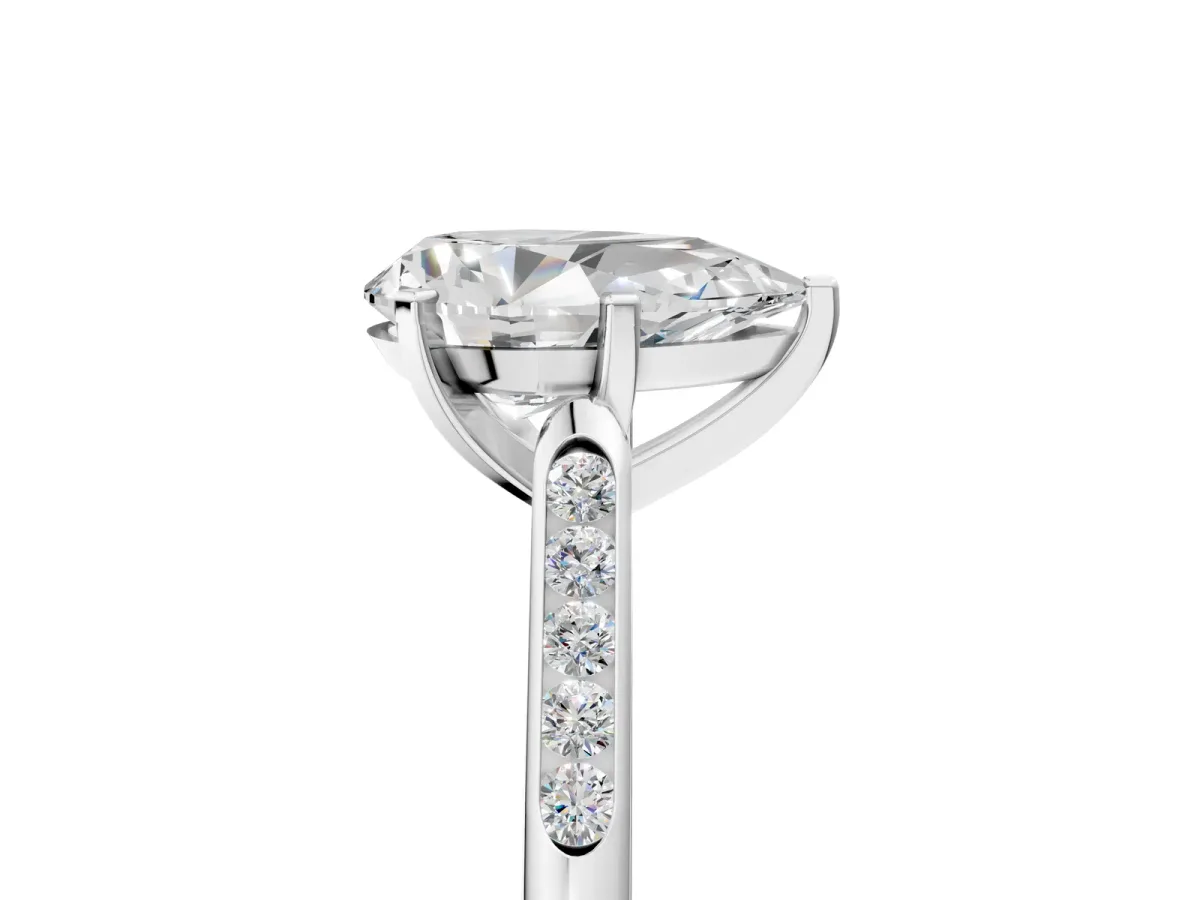 Pear Cut Diamond Solitaire Ring with Channel Set Round Band and Prong Setting Silver
