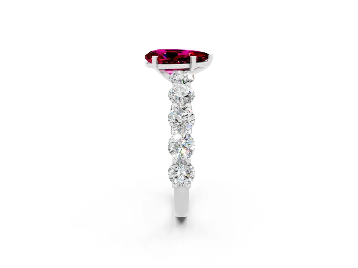 Pear Cut Garnet Prong Setting with Side Stones on a Pave Band Silver