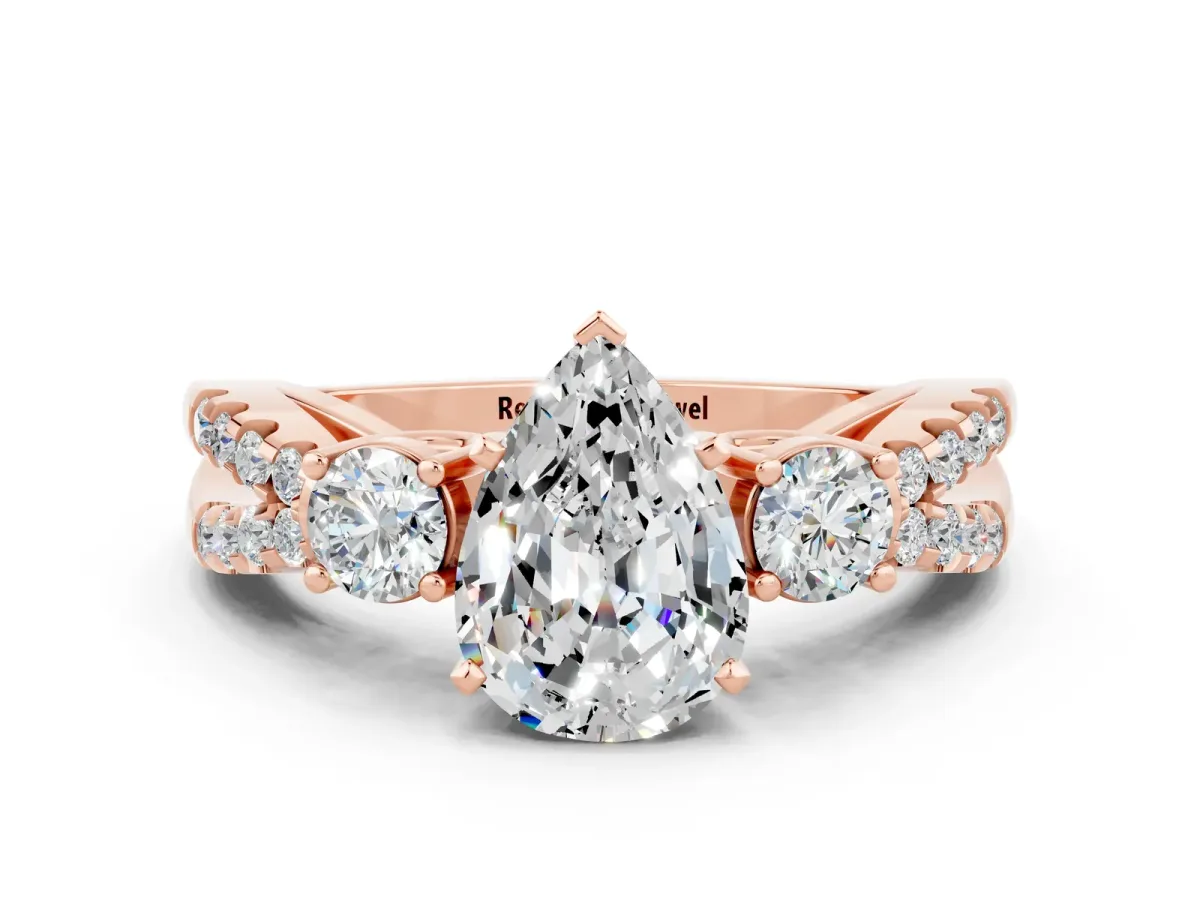 Pear Cut Moissanite Three-Stone Ring with Pavé Split Shank and Four-Prong Setting Rose gold