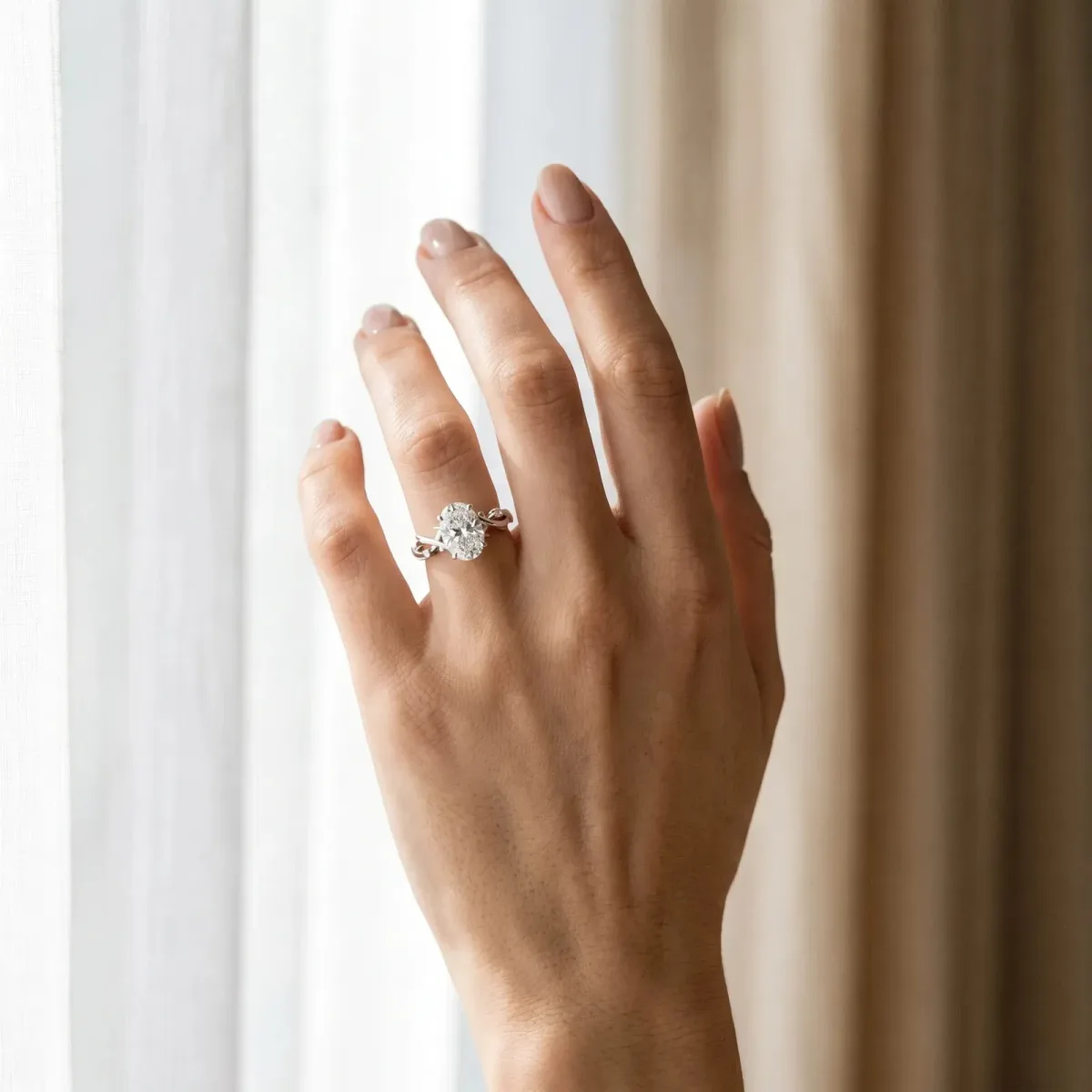 Oval Cut Diamond Solitaire Ring with Twisted Band and Prong Setting Silver