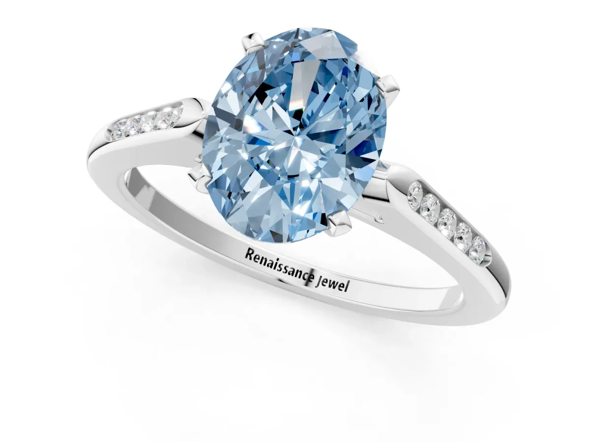 Fancy Blue Oval Cut Diamond Solitaire Ring with Channel Set Round Band and Prong Setting Silver