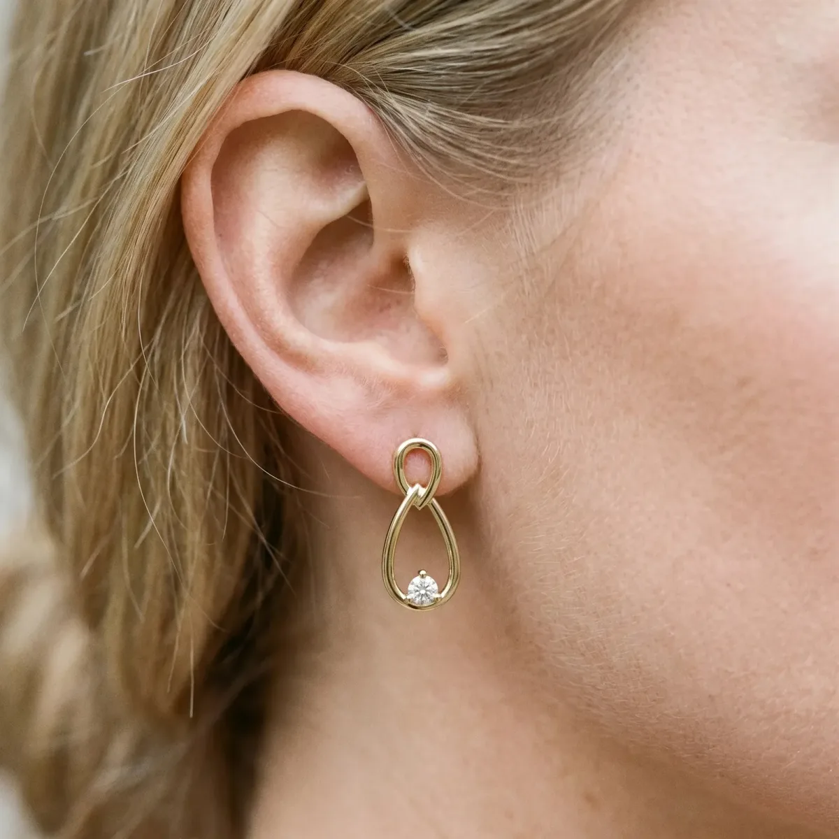 Round Diamond Teardrop Earrings with Bezel Setting and Loop Band Yellow gold