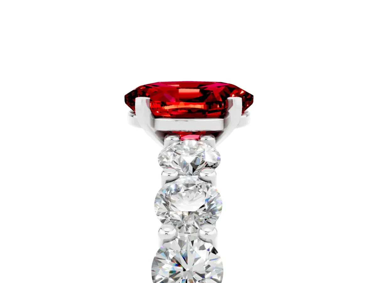 Oval Cut Ruby Prong Setting with Side Stones on a Pave Band Platinum