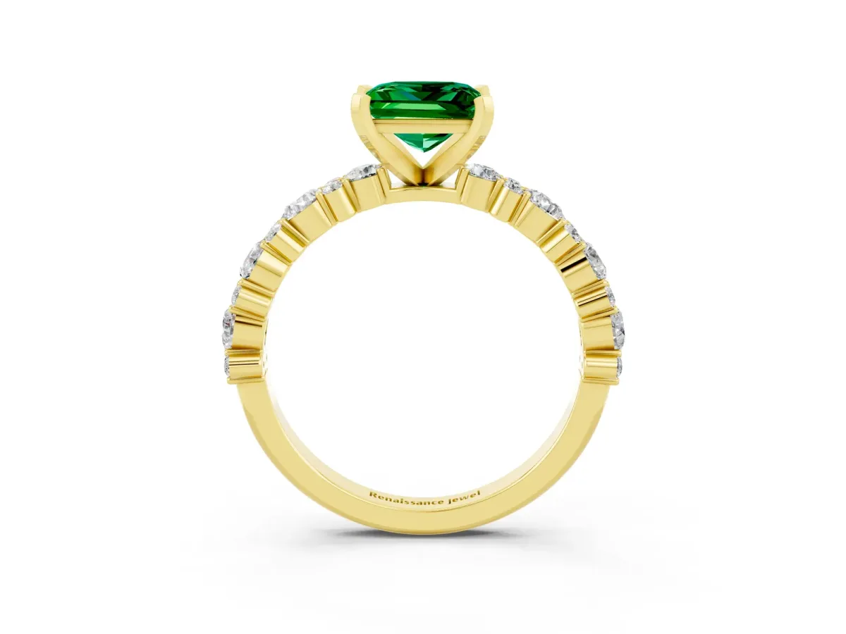 Princess Cut Emerald Side Stone Solitaire Ring with Round and Four-Prong Setting Yellow gold