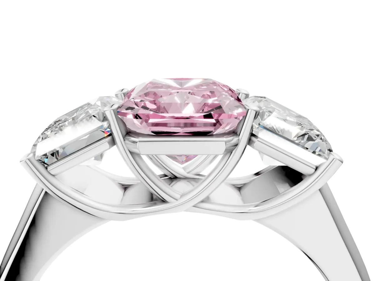 Fancy Pink Radiant Cut Three-Stone Diamond Ring with Prong Setting on a Classic Band Platinum